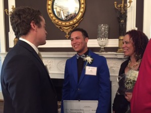 Sam accepting his $2,000 scholarship!